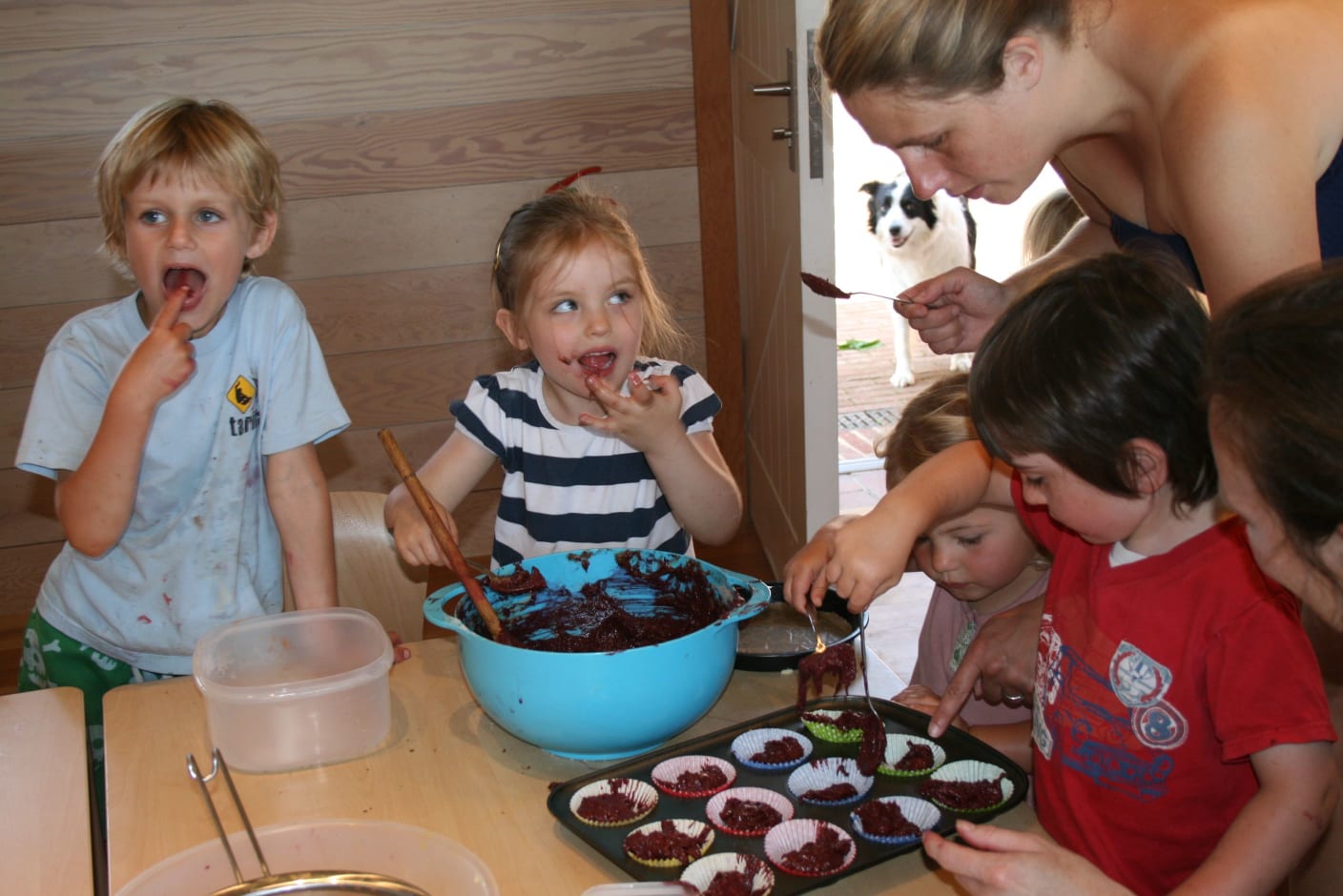 Images of children cooking beetroot and chocolate cakes in the Education room at Dixter Farm