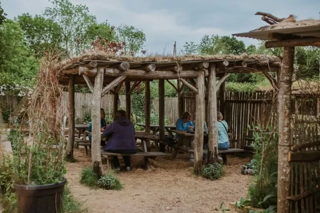 Covered seating at Great Dixter in the Loggia